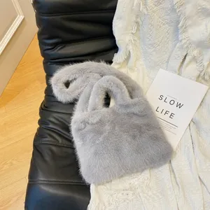 Cozy grey fluffy handbag, soft plush shoulder bag, stylish faux fur tote bag for women.
