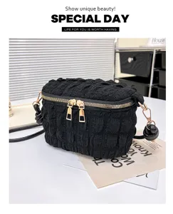 Stylish black ruched crossbody bag puffy vanity bag with gold zippers and soft cloud design.