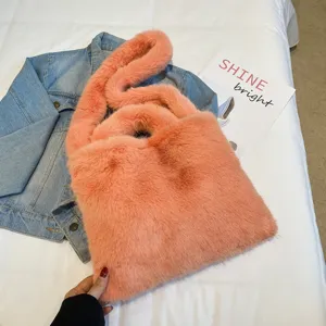 Fluffy plush shoulder bag for women, cozy faux fur tote and stylish casual crossbody bag.