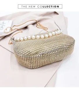 Chic rhinestone evening shoulder bag with elegant pearl trim, luxury gold party handbag.