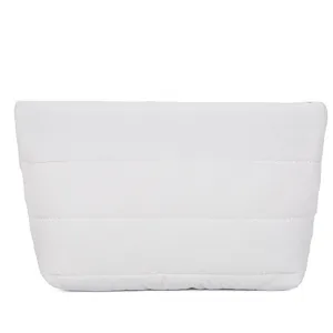 Minimalist white quilted clutch bag for women, stylish padded evening pouch for commute.