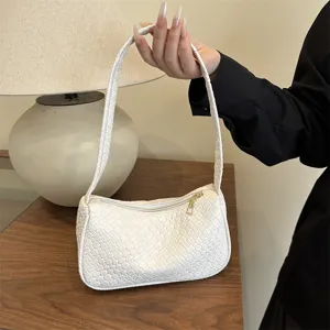 White woven shoulder bag for women, stylish underarm handbag with zipper closure, daily use.