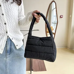 Black quilted nylon shoulder bag, lightweight casual underarm bag, autumn minimalist handbag.