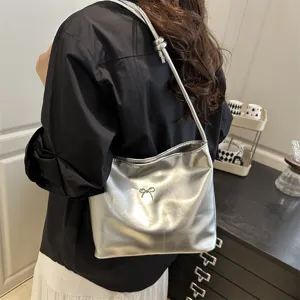 Stylish metallic shoulder bag for women, casual minimalist tote purse for daily commute.