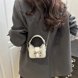 Korean style bow kids mini handbag with chain strap, stylish shoulder messenger bag for girls.