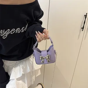 Cute purple mini shoulder bag for women, stylish bow chain handbag and crossbody bag.