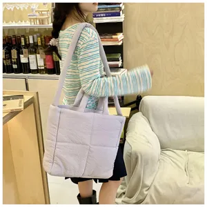 Niche design padded shoulder tote bag, large capacity quilted cloud handbag for daily use.