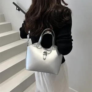 Silberne metallische Vintage Handtasche Damen vielseitige Schultertasche elegante Tasche.