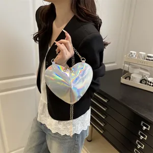 Heart-shaped holographic patent leather crossbody bag with gold chain for trendy outfits