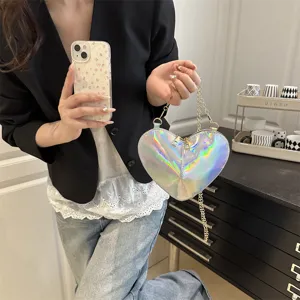 Holographic heart shaped shoulder bag, trendy patent leather mini crossbody bag for women.