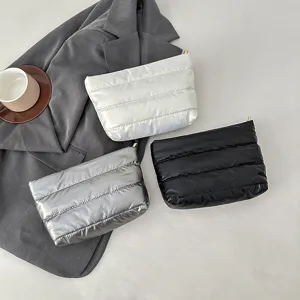 Minimalist quilted puffer cosmetic bag, soft padded clutch and daily makeup pouch for women.
