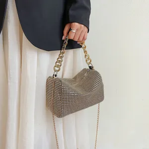 Stunning rhinestone chain evening bag, elegant hand-held and crossbody design for women.