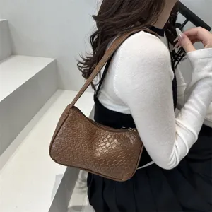 Stylish brown woven shoulder bag for women, trendy underarm baguette bag for daily wear.