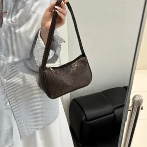 Dark brown woven leather shoulder bag underarm bag chic classic designer style handbag.