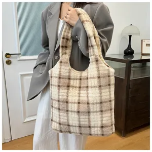 Fluffy plaid tote bag detail view, soft plush fabric texture, roomy casual handbag.