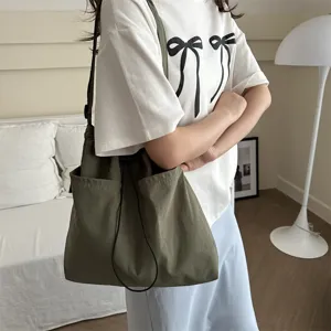 Große Kapazität Mehrfache Taschen Umhängetasche lässige Canvas Schultertasche für Frauen.