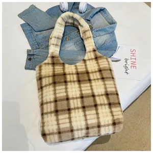 Detailed view of the vintage plaid plush tote bag, showing soft texture and cozy design.