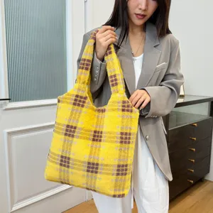 Yellow plaid plush tote bag for women, soft furry shoulder bag for daily commute and casual wear.