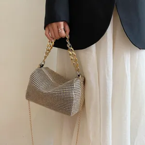 Rhinestone cylinder evening bag with chunky chain strap for stylish women and parties.