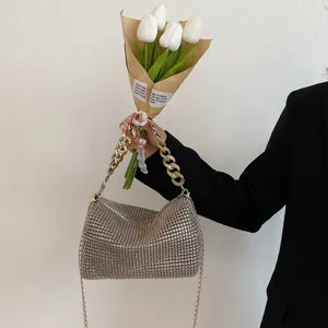 Chic rhinestone chain evening bag for women, sparkling luxury crossbody shoulder purse detail.