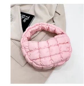 Pink quilted puffer cloud bag trendy pleated underarm handbag stylish mini accessory.