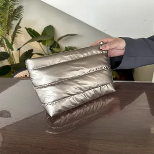 Metallic puffer clutch bag, trendy quilted design, stylish large capacity womens handbag.