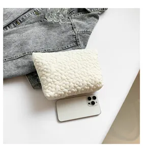White quilted cosmetic bag trendy floral clutch minimalist travel pouch stylish daily purse