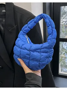 Blue quilted puffer underarm bag, trendy grid cloud handbag for women daily fashion style.