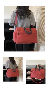 Large capacity travel duffel bag for women and men, lightweight gym sports luggage bag with strap.