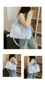 Large capacity travel shoulder bag in light blue star pattern with detailed embroidery view.