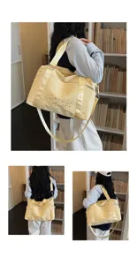 Large capacity travel duffel bag for women, lightweight commuting shoulder bag with star pattern.