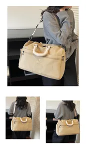 Large capacity beige travel duffel bag for women, lightweight gym and weekend luggage.