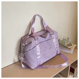Light purple travel duffel bag with star print, stylish casual gym shoulder bag detail view.