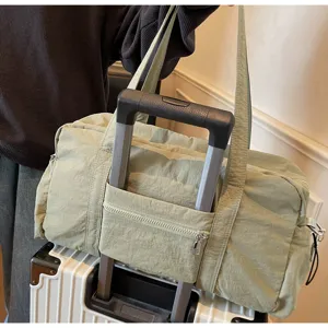 Large capacity travel duffel bag with luggage sleeve waterproof gym bag for women