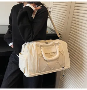 Large capacity travel duffel bag with shoulder strap, expandable gym bag for women.