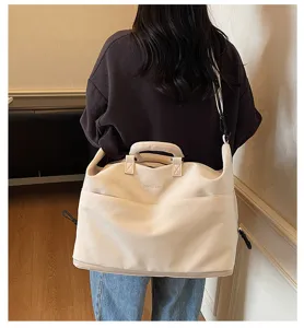 Grand sac de voyage bandoulière, sac de sport casual en toile pour week-end et fitness quotidien.