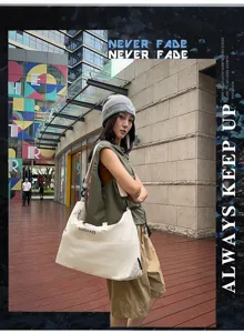 Large capacity travel duffel bag detail showing durable material and urban style.