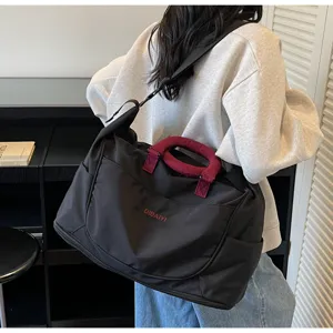 Large capacity travel duffel bag waterproof gym shoulder bag casual business trip luggage.