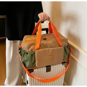Large capacity travel duffel bag with wet dry separation, stylish grid design for gym and weekend trips.