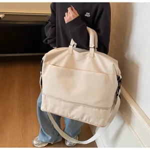 Large capacity beige travel duffel bag lightweight shoulder fitness luggage bag for daily commuting