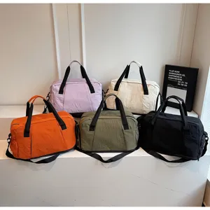 Large capacity travel duffel bag multi-color waterproof sports gym luggage storage bag.