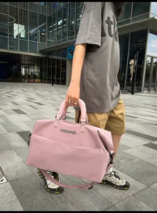 Large capacity travel duffel bag for women and men, gym sports luggage bag with strap.
