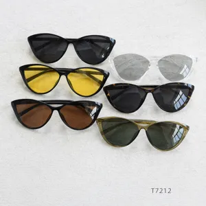 Detailed view of trendy retro cat-eye sunglasses in various chic lens colors for fashion styling.