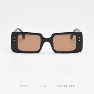 Square sunglasses frame detail view, stylish black TR material with brown polarized lenses.