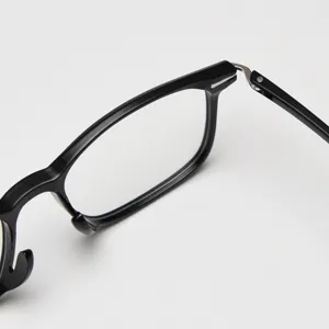 Close-up detail shot of black TR90 lightweight retro optical glasses frame for daily wear.