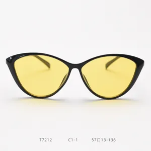 Vintage cat-eye sunglasses for women, oversized black frame with yellow lenses for trendy style.