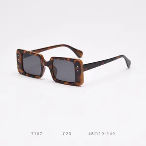 Detailed view of trendy rectangular tortoise polarized sunglasses, premium frame and UV protection.