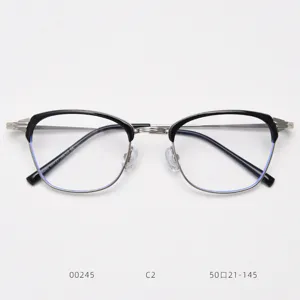 Vintage metal half-rim optical glasses frame detailed view, stylish black & silver finish.