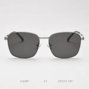 Detailed view of vintage metal frame sunglasses, showing slim silver temples and hinges.