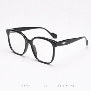 Detailed view of black optical glasses frame, classic large square design for daily wear.